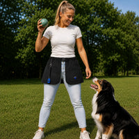 trainingsrock-hund-schwarz-mit-frau-und-hund-31431